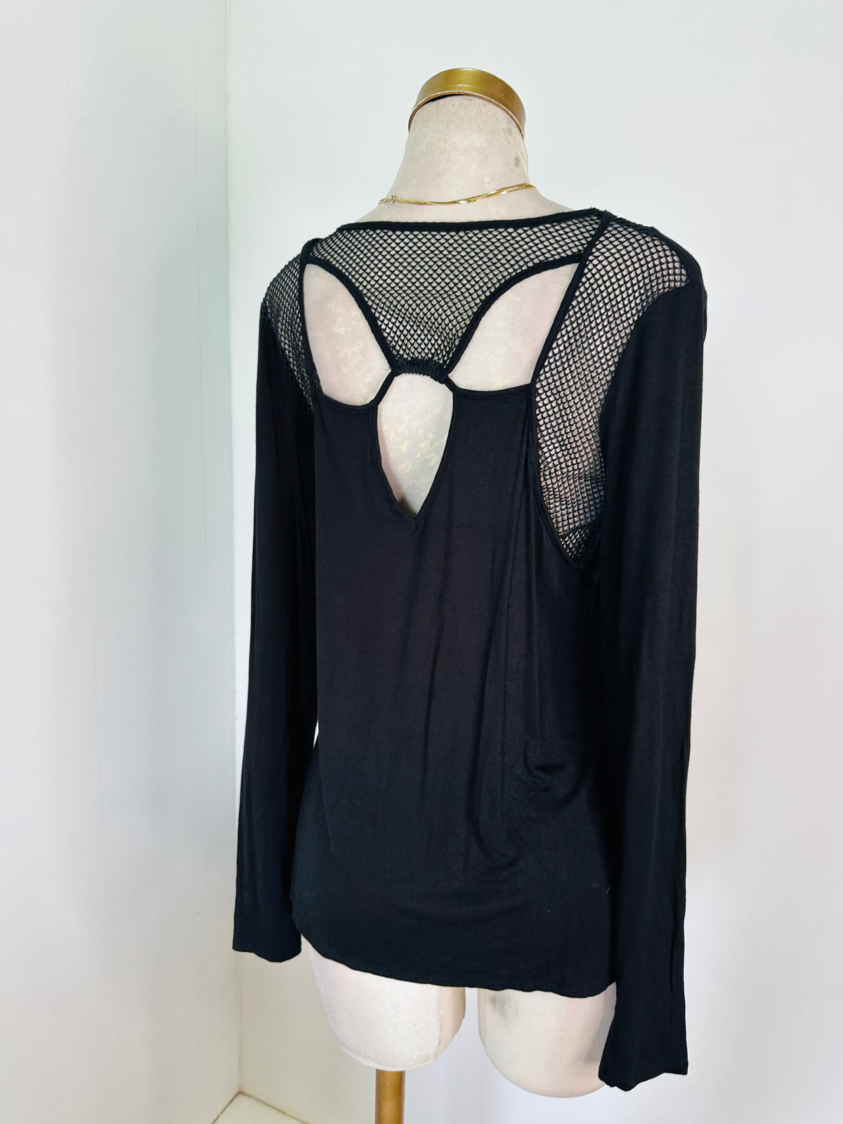 Blusa negra manga larga