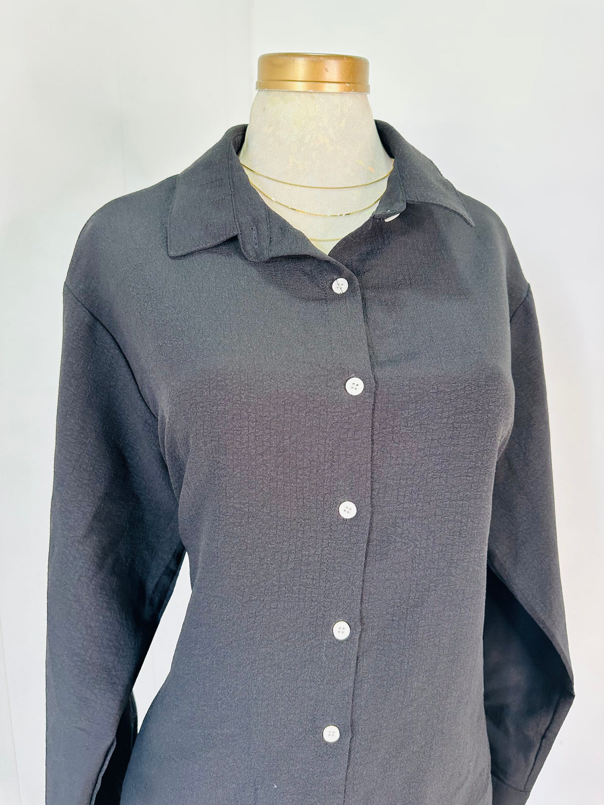 Blusa manga larga negra