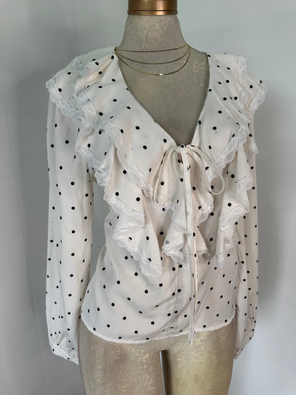 Blusa lunares