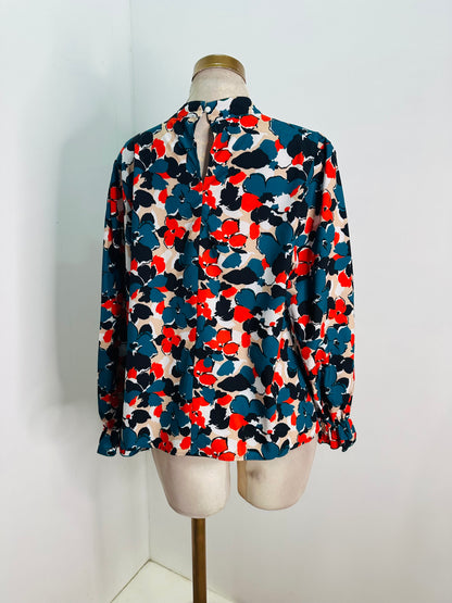 Blusa flores