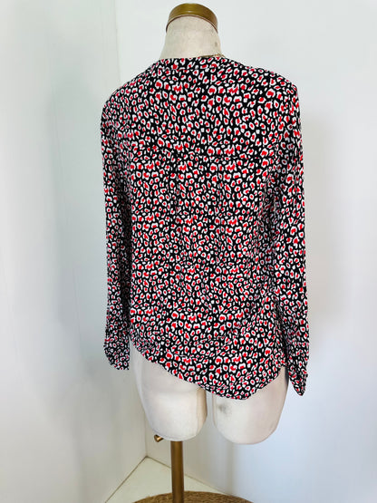 Blusa.