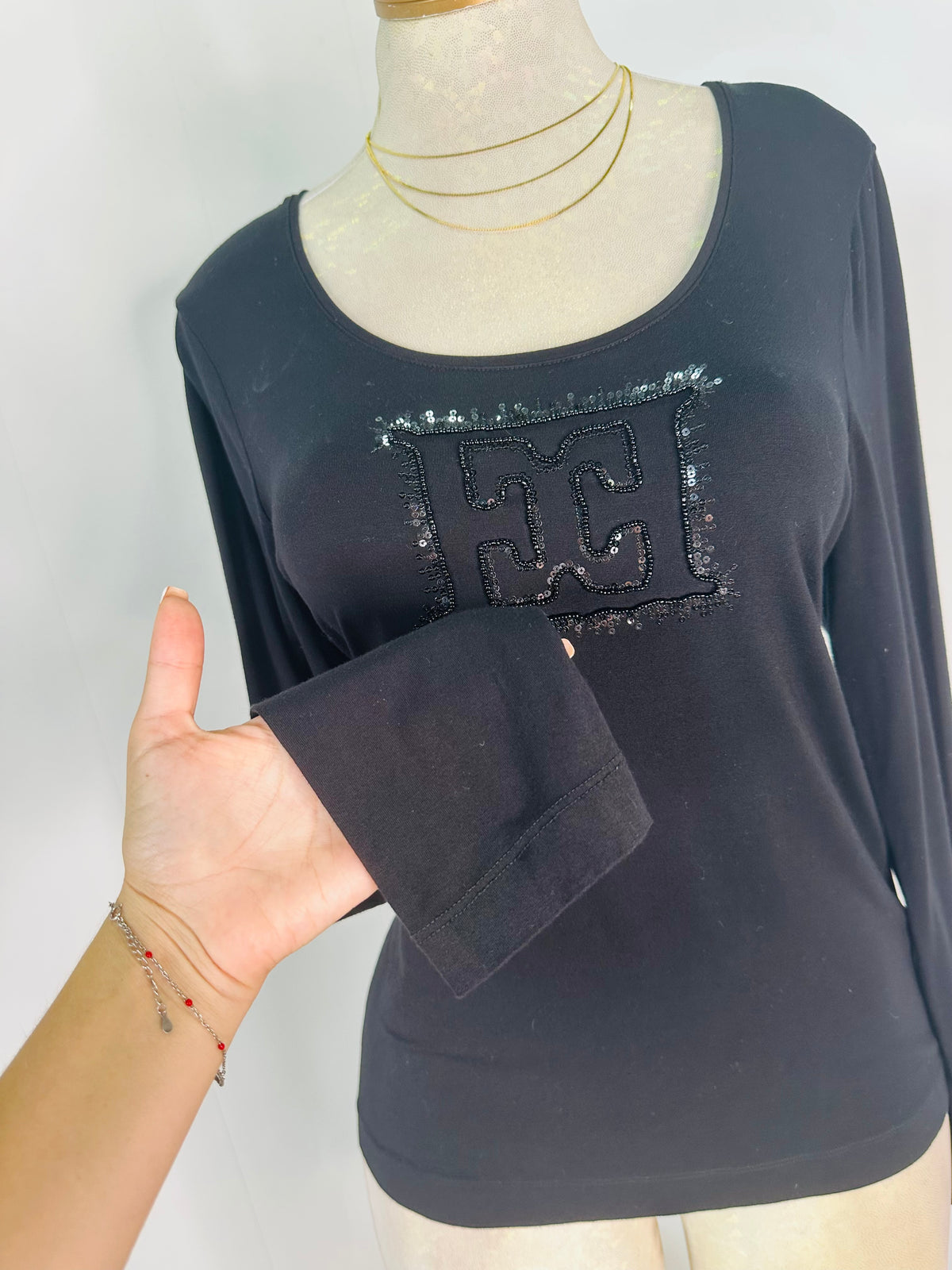 Blusa negra manga larga