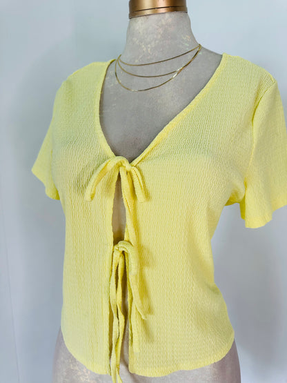 Blusa amarilla lazos